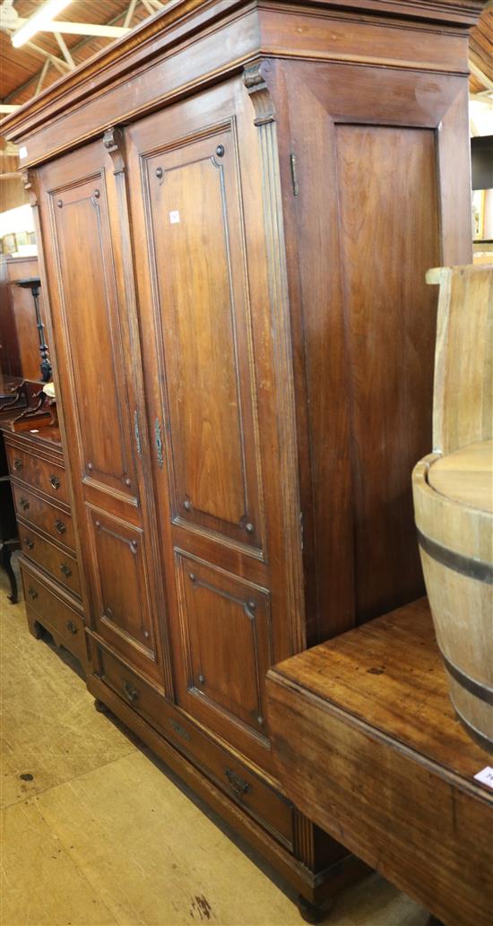 Continental walnut two door armoire